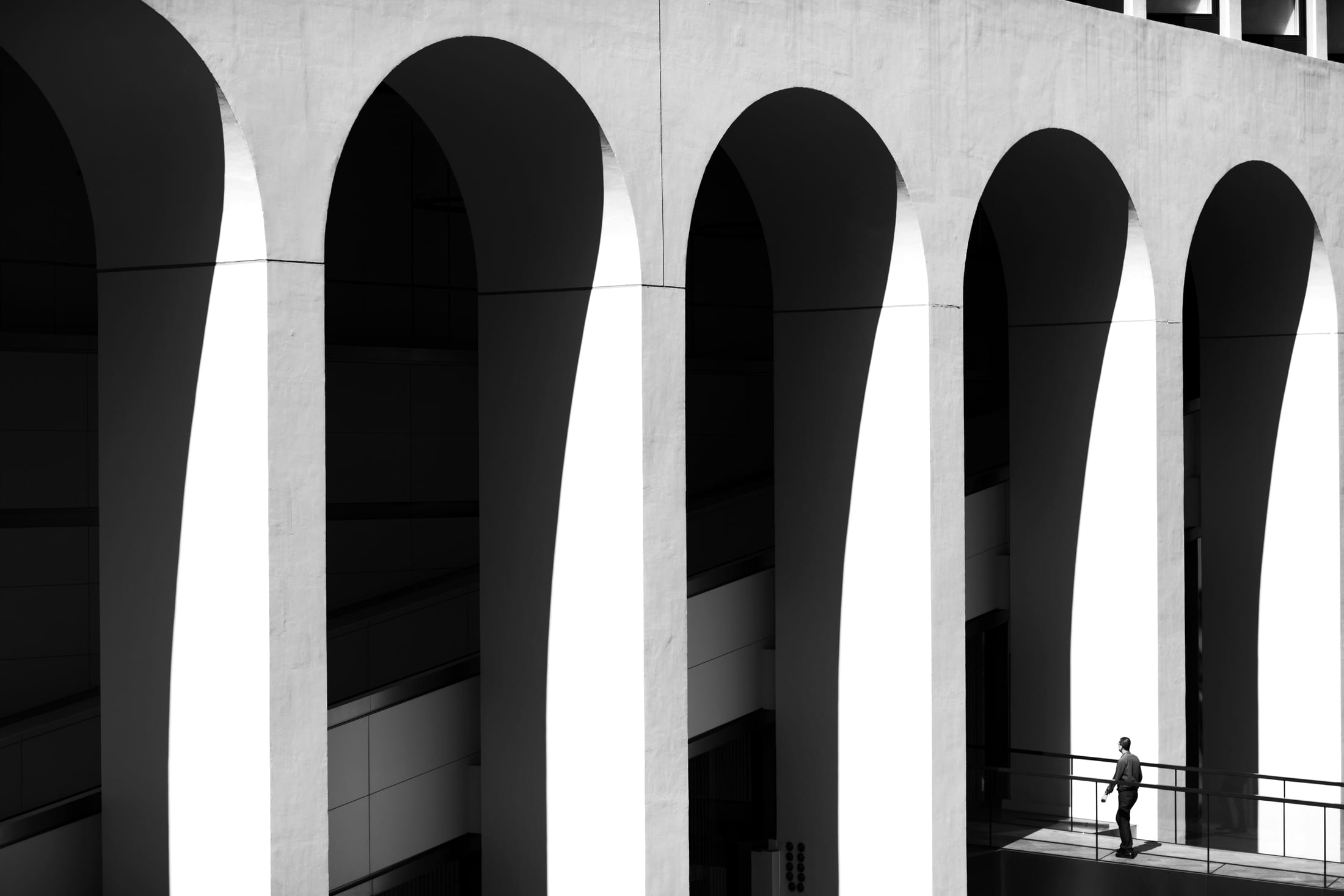 White arches casting long shadows