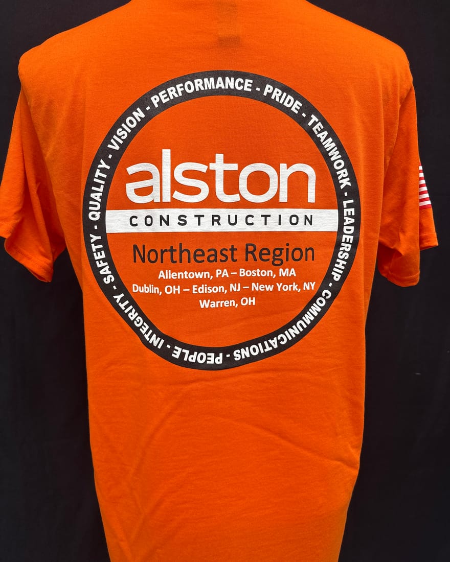 A screen-printed orange company T-shirt